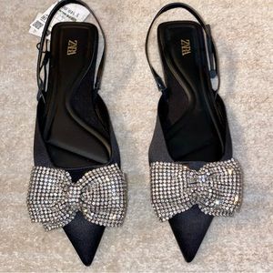 Brand new, rhinestone bow embellished black sling backs. With tags. Size 8 Zara